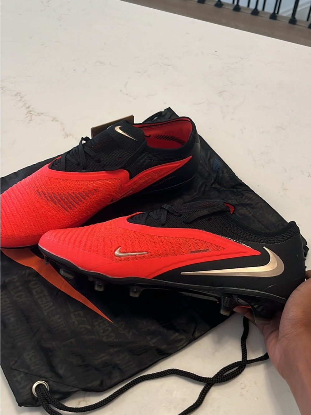 Nike Men’s Red and Black Football Cleats with Metallic Silver Swoosh